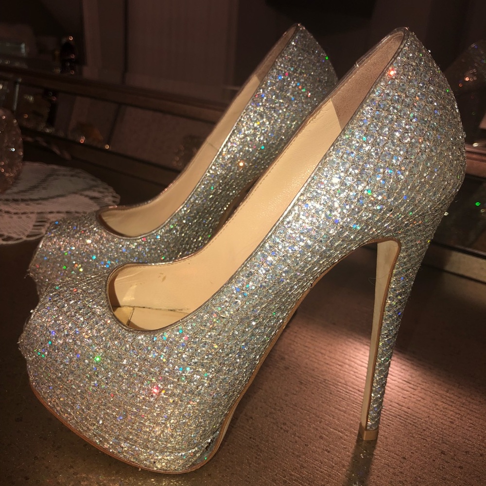 Giuseppe Zanotti peep toe platform heels.